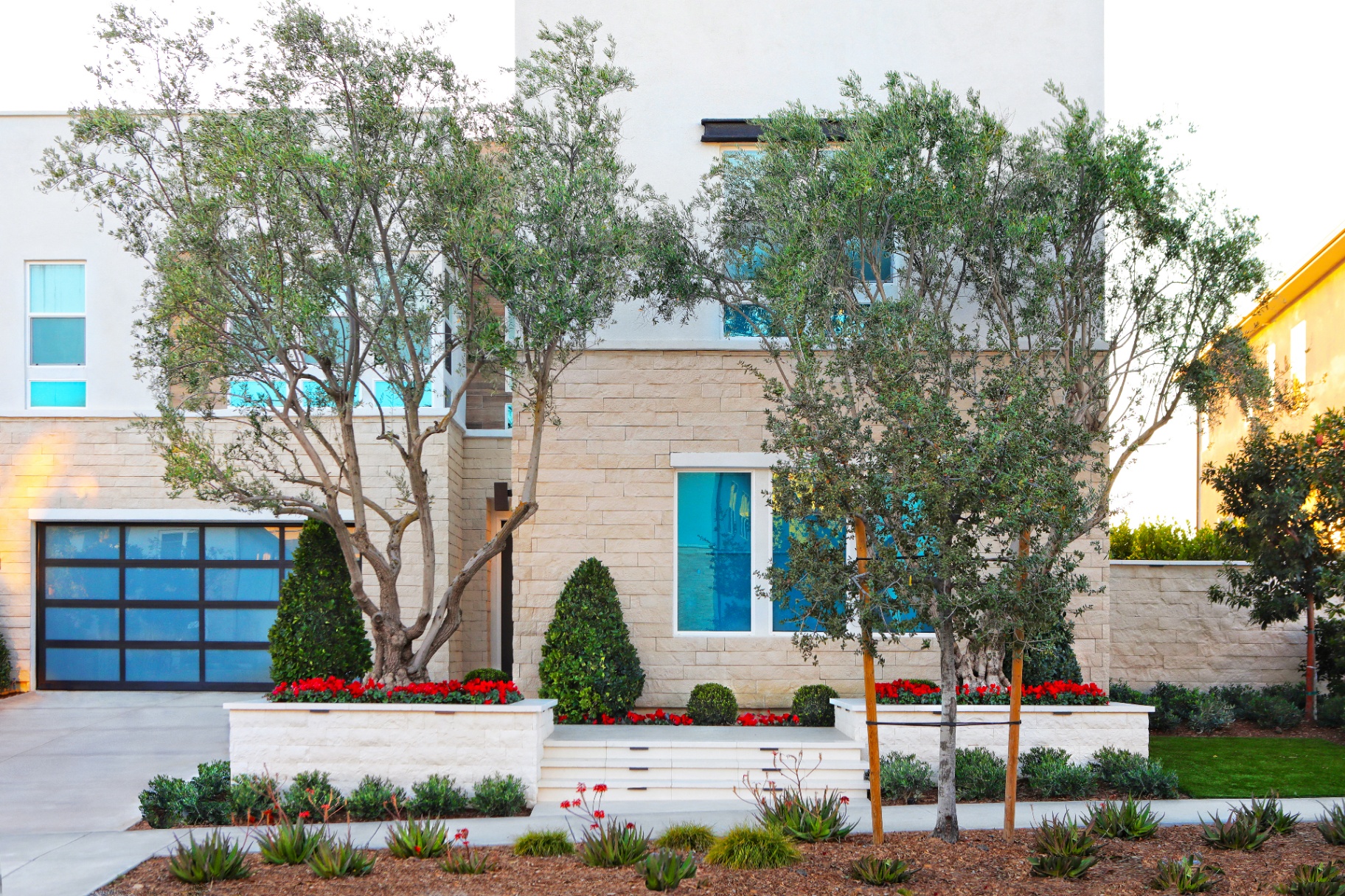 BSH Landscape & Hardscape — Mediterranean estate with stone paving and formal gardens