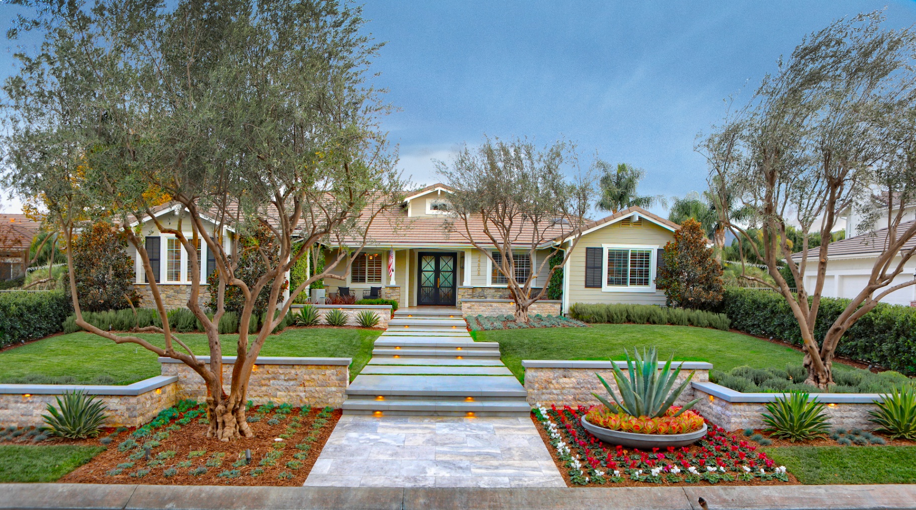 BSH Drainage Solutions — craftsman home with stone walkway and integrated drainage