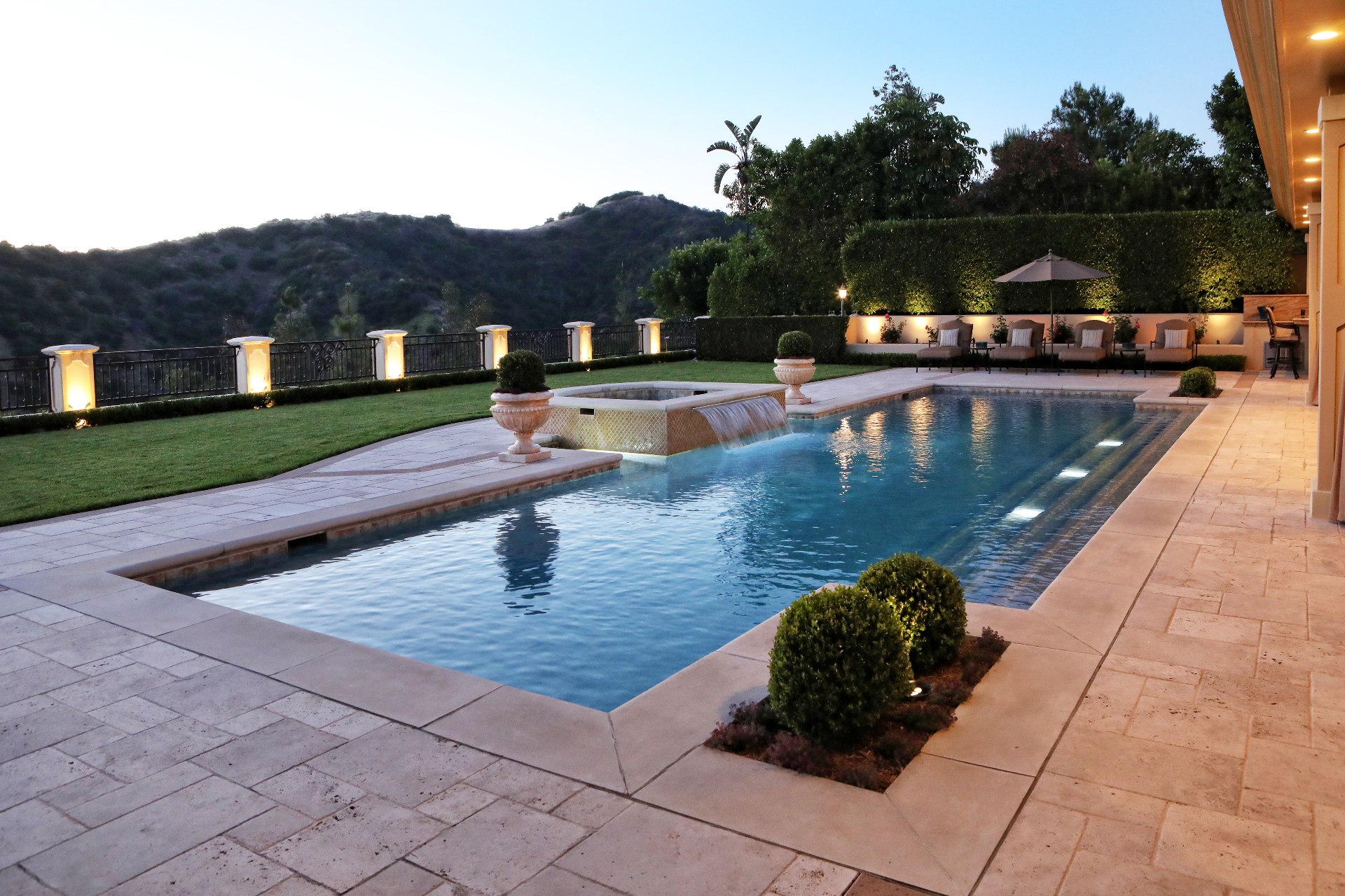 BSH Landscape & Hardscape — custom stone walkway with landscape lighting