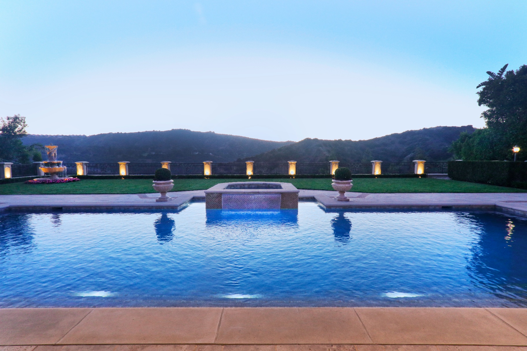 BSH Landscape & Hardscape — travertine patio with outdoor seating area