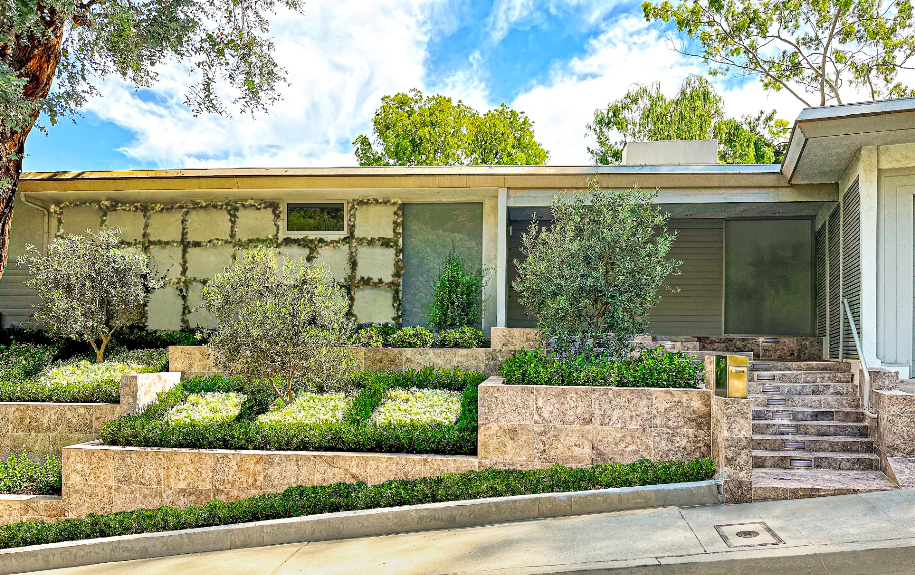 BSH Landscape & Hardscape — retaining wall with integrated planting beds