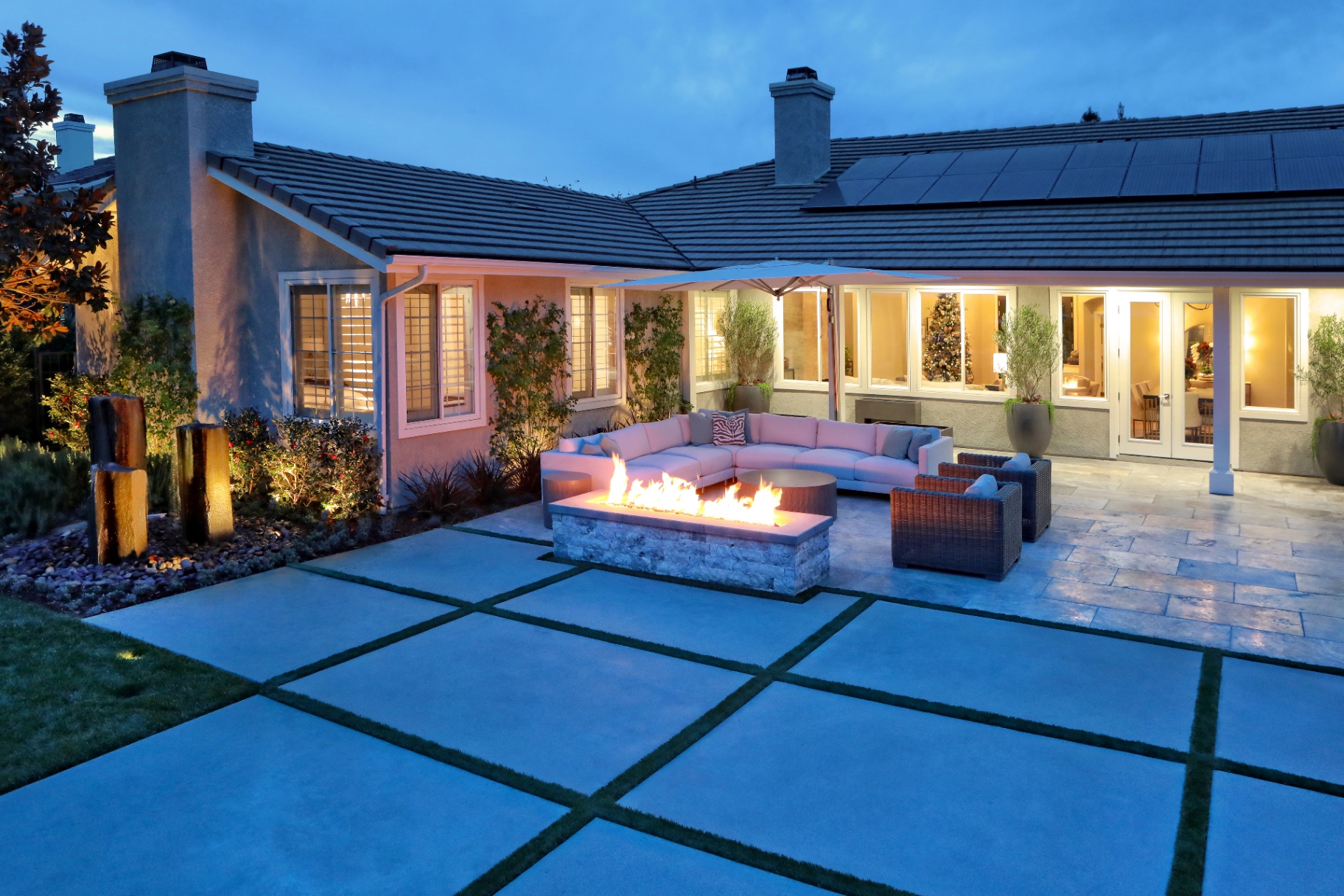 BSH Fire Features — fire pit lounge area at night